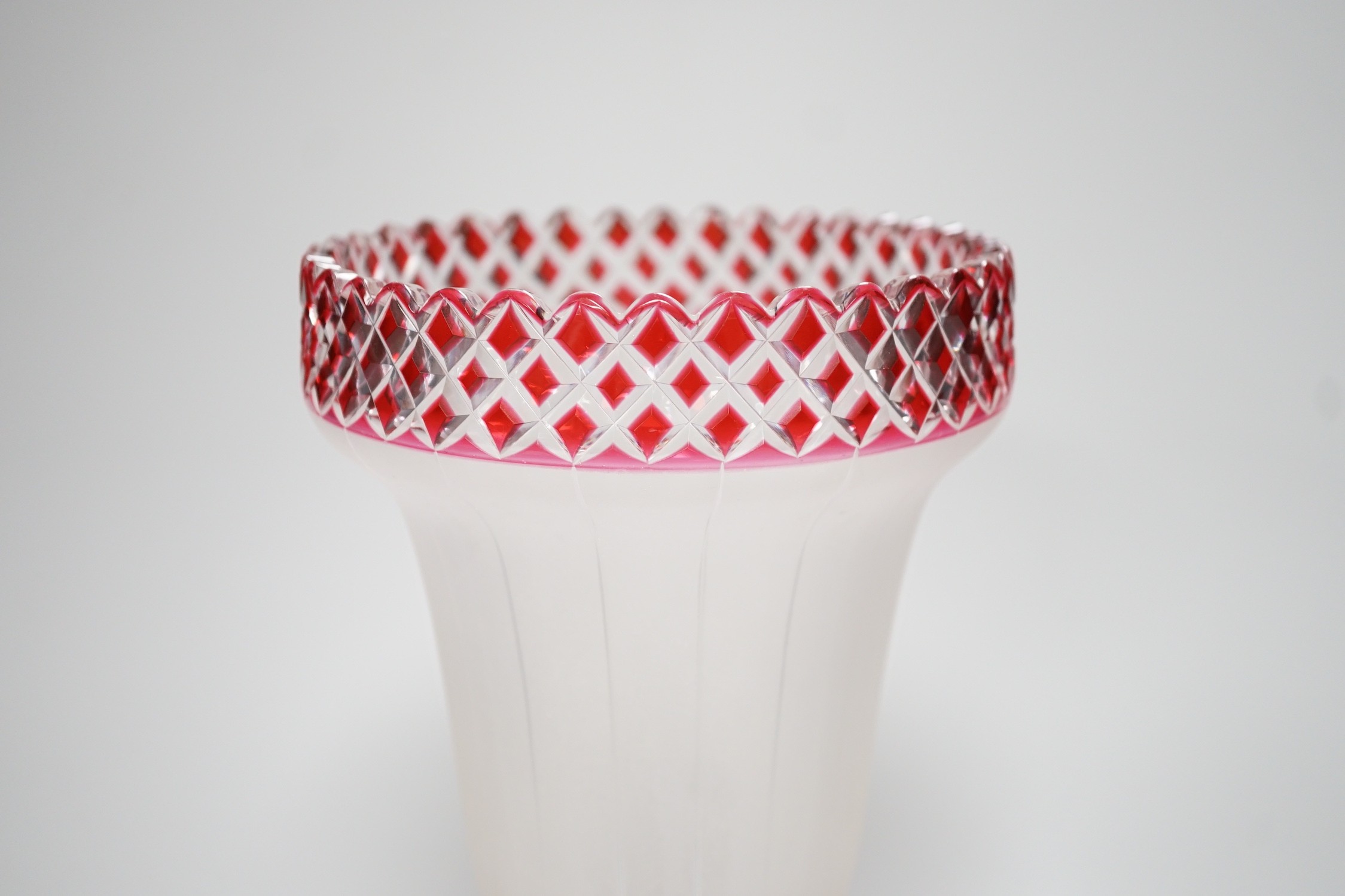 A late 19th century frosted and ruby flashed cut glass vase, 27.5cm